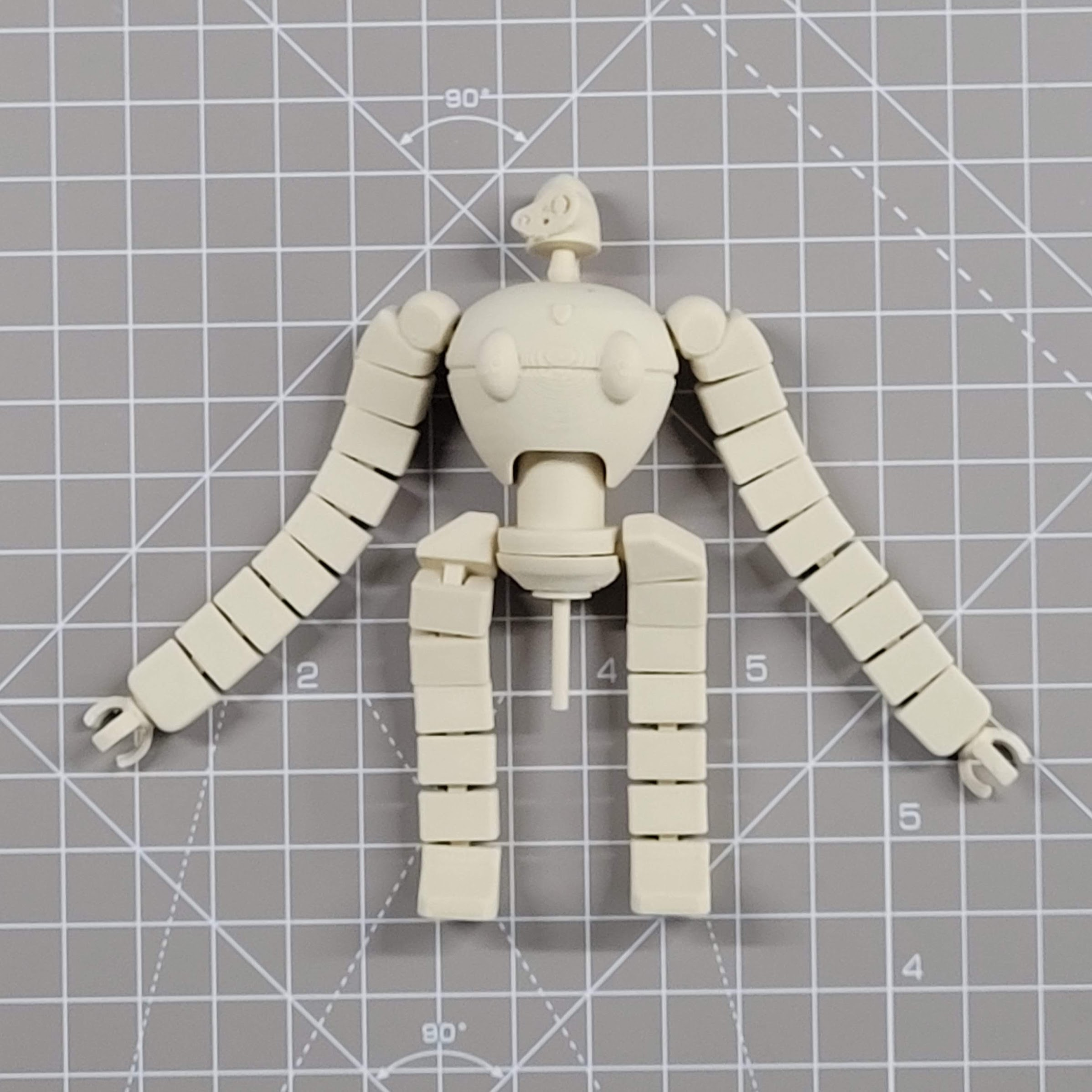 The robot fully built with a pin glued to its bottom